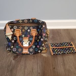 Louis Vuitton handbag and matching wallet.